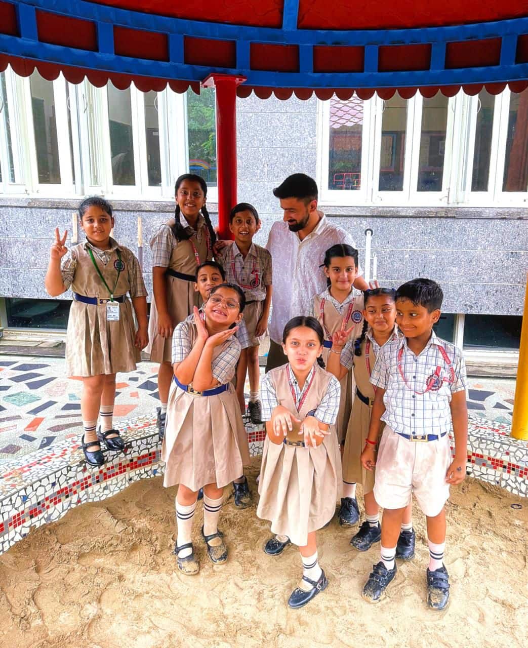 Parth with schoolchildren